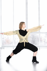 Dancer female doing lunge in class