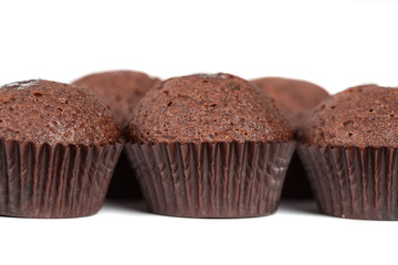 chocolate cupcakes muffins on white