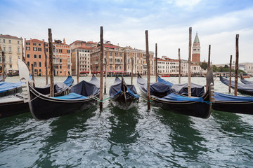 Fototapeta na wymiar Moored gondolas in Venice, Italy.