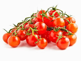 Cherry vine tomatoes on white background