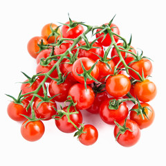 Cherry vine tomatoes on white background