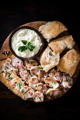Served meal on wooden board