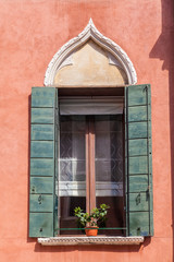 Fototapeta na wymiar Detail of a window in Venice, Italy
