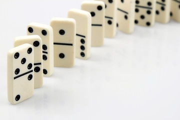 Dominoes standing in a row