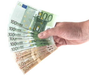 Hand holding out a fan of eurobill money