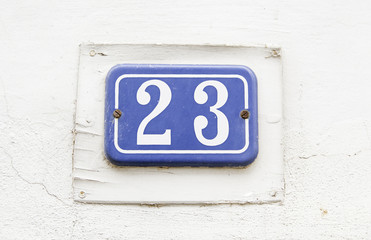Number twenty-three on the wall of a house