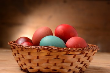 Colored easter eggs in basket