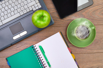 green apple on worplace
