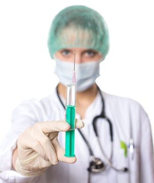 female doctor holding a syringe