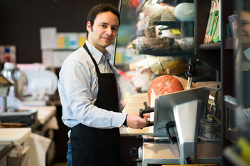 Shopkeeper at work in a grocery store © Minerva Studio