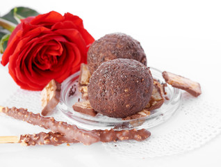 Cupcake with chocolate on wooden background