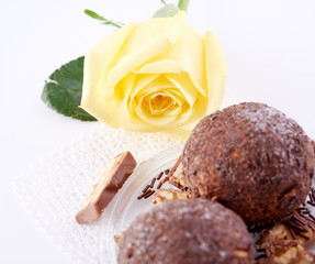 Cupcake with chocolate on wooden background