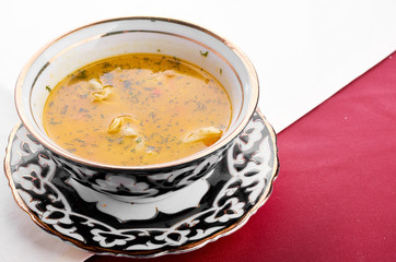Bowl of chicken soup with vegetables and noodles