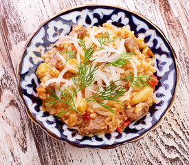 Oriental shah pilaf, pilaw, plov, rice with meat in pastry filo