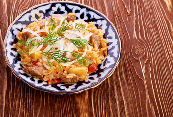 Oriental shah pilaf, pilaw, plov, rice with meat in pastry filo