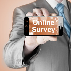 Businessman showing business concept on smartphone  - Online