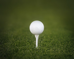 Golf ball on tee ready to be shot