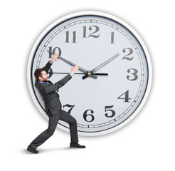 young businessman trying to stop a time