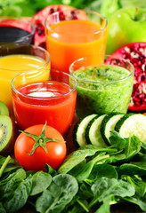 Glasses of fresh organic vegetable and fruit juices