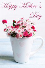 Beautiful flowers in cup