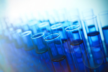 Test-tubes with blue fluid, close-up