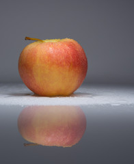 Yellow-red apple with droplets