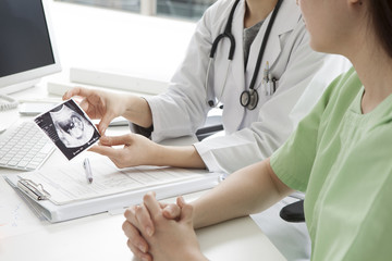 Obstetrician and women of the examination room