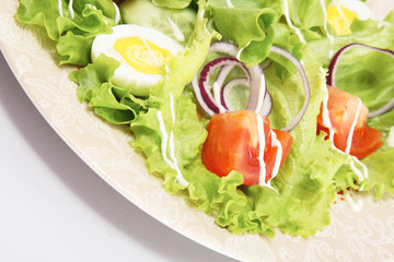 closeup of a fresh salad on the plate