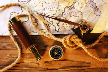Marine still life with world map and rope