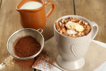 Cup of hot coffee with marshmallow and cup of milk with