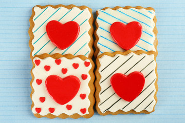 Obraz na płótnie Canvas Heart shaped cookies for valentines day on color background