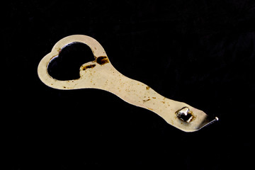 Bottle opener on black