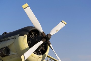 Naklejka na ściany i meble White airplane propeller with four blades