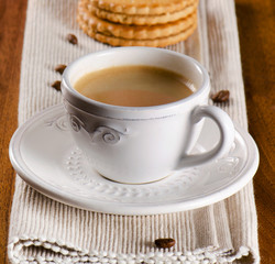 Coffee cup and cookies
