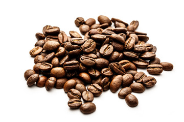 Brown coffee beans on white