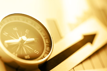 Diagram concept with compass and arrow