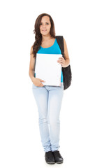 Attractive student standing in front of white background.