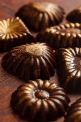 chocolate sweets with edible golden powdeer
