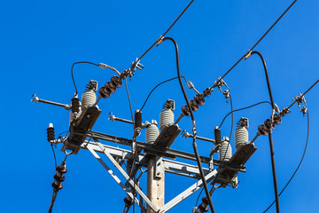 electricity power concrete pole on blue sky background