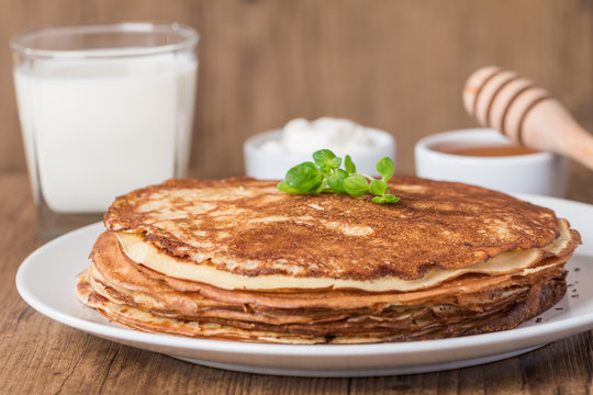 pancakes with sour cream, milk and huney