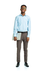 Fototapeta premium Happy african american college student with laptop standing on w