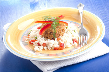 fish cake on rice with red bell pepper