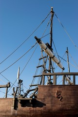 Caravel, detail of ropes, ladder and folded sails