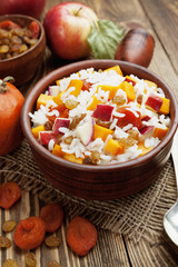 Sweet pilaf with pumpkin, apples and dried fruit
