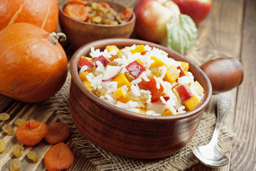 Sweet pilaf with pumpkin, apples and dried fruit