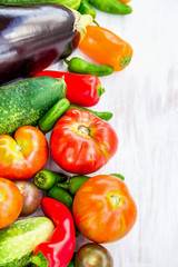 Summer vegetables on white wooden table