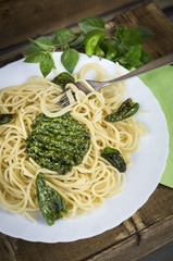 spaghetti with basil pesto and pepperoni