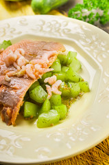 Trout with braised cucumber and shrimp , clouse up
