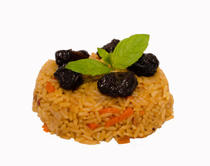 pilaf with dried plums isolated on white background