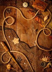 Sea concept on a wooden table background